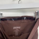 SKIMS  Sculpting Mid Thigh Shorts in Cocoa Size XX-Small/X-Small Photo 4
