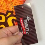 Next Level Apparel Hersheys Chocolate World Reese’s orange Racerback tank NWT Small Photo 2