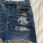 American Eagle  Next Level Stretch Distressed Dark Denim frayed shorts  S… Photo 4
