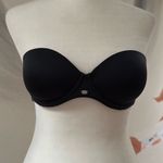 Calvin Klein  strapless bra.  Size 30c. Black. Padded. Non slip edges. Photo 0