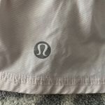 Lululemon  ruffled skirt, size 2, and a light pink color Photo 2