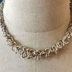 Avon silver tone multi ring necklace Photo 0