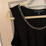 Coco Bianco  sleeveless, black sheath dress with gold chain detail Photo 4