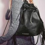 Victoria's Secret NWT Victoria’s Secret faux leather fringe backpack drawstring bag Photo 1