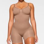 SKIMS  Seamless Sculpt Mid Thigh Bodysuit Sienna Size Small Photo 1