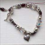 Swarovski NWT crystal, Garnet & Sterling bracelet with “Faith” heart charm Silver Photo 0