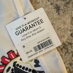 Athleta Women's White Board Shorts with Pink Accents Photo 1