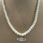 Elegant Fuax Pearl Necklace with Silver Saturn Pendant White Photo 0