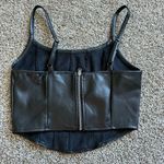 Women's black leather zip‎ crop top Photo 1