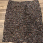 Tahari  pencil skirt.  Size: 12.  Small slit on back. Metallic thread throughout. Photo 0