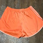 Adidas Women’s  sprinter shorts in semi coral! NWT 3 Strip Size XL Photo 3