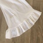 Michael Kors MK white T with ruffle hem sleeve . Photo 1