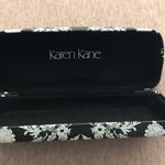 Karen Kane  Glass Case Photo 1