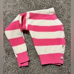 Jessica Simpson , pink and off-white striped cropped cardigan.￼ Photo 3