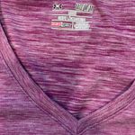 Under Armour Loose Fit Size Medium Heathered Pink/Purple Shirt, pit to pit is 18, length is 25 Photo 2