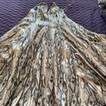 Jennifer Lopez Snakeskin Pleather jacket and Dress Photo 1