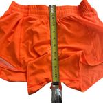 Lululemon Hotty hot bright orange high rise 4” lined shorts sz 6 Photo 6
