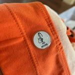 Gigo Active Brazil halter sports bra in orange white and yellow size S small NWT Photo 9