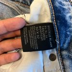 Buckle Black Jeans Photo 2