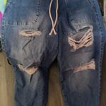 Celebrity Pink Distressed Denim Joggers Photo 0