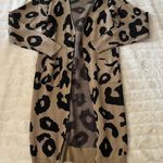 Angashion Sweater Photo 1