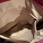 Travelon Anti-Theft Classic Mini Shoulder Bag in the Berry Tulip color Photo 7