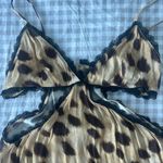 We Wore What NEW  V-neck Cutout Dress Leopard
Tan Photo 4