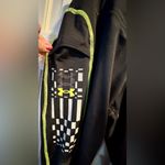 Under Armour Women’s  leggings - size XL - black w/neon green stitching - pockets Photo 6