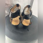 Nine West  wedge‎ sandal size 7 1/2 black 
Bin 1 Photo 1