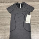 Lululemon Swiftly Tech Short-Sleeve Shirt 2.0
Hip Length - Spandex Black & White Stripe Photo 4