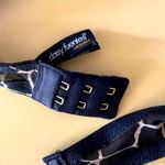 Daisy Fuentes  giraffe push-up bra Photo 9