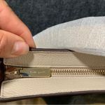 Kate Spade NWT  Leila North South Crossbody taupe color peddled leather F9 Photo 5