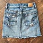 American Eagle AEO Next Level Medium Wash Distressed Ripped Jean Skirt Size 0 Photo 5