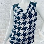 Valerie Stevens Valerie I was size 1XSleeveless   Black and white print blouse   Featuring faux leather with metal dots on the shoulder.   banded waist Photo 1