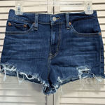 Levi's Denim Jean Shorts Med Wash Size 27 Booty Mid Rise Raw Hem Zip Pockets Photo 0