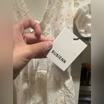 NWT Rubienn Eyelet Tired Back Tie Frill Mini Dress In Off White Photo 9