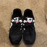 New Balance  Black and White Sneakers with Pink Accents Photo 1
