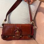 vintage wilson’s leather red y2k shoulder bag with buckle detail Photo 1