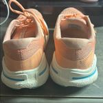 Brooks Ghost Max running shoes in a Papaya/Apricot/Blue Women’s 9B Photo 2