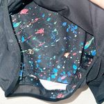 Fabletics Women's Quinn Mesh Paint Splatter Zipper Back Pocket Running Shorts Photo 1