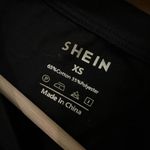 SheIn Women's Black Cropped T-Shirt |
Short Sleeve | Crew Neck | Casual
Top xs Photo 2