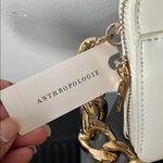 Anthropologie Cream Crossbody Bag with Gold Chain ✨ Photo 1