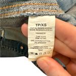 Garage  distressed denim jacket with frayed detailing and button-up closure Photo 3