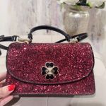 Kate Spade New York Odette Glitter Mini Top Handle Bag in Black/Cherry Photo 1