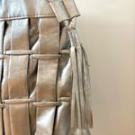 Vegan leather silver woven zippered top tote bag. 17” by 13”. Photo 2