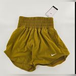 WORKOUT SHORTS NEW
Nike Women's High-Waisted Running Shorts Photo 6
