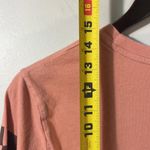 Vans  XS long sleeve crop top logo shirt on peachy tone. Photo 6