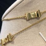 Kate Spade  Gold Tone Gold Enamel Bow Long Necklace Photo 11