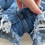 REWASH  Medium Wash Mid Rise Heavily Distressed Raw Hem Denim Short Shorts Size 7 Photo 2