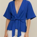 Bella and Blue Tie Photo 0